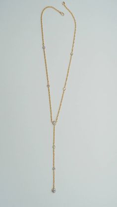 **ZOOM for better detail *Water safe FEATURES: - 14k Gold filled rope chain and clasp - 14k Gold filled CZ diamonds MEASUREMENTS: Necklace measures 18 inches. Drop measures 4 inches Handmade in Los Angeles. Formal Gold Chain Lariat Necklace, Diamond Lariat Necklace With Clavicle Chain, Fine Jewelry Lariat Backdrop Necklace With Diamond Accents, Delicate Lariat Chain Necklace For Formal Occasions, Fine Jewelry Backdrop Lariat Necklace With Diamond Accents, Luxury Gold Chain Lariat Jewelry, Luxury Lariat Gold Chain Jewelry, Luxury Lariat Backdrop Necklace With Delicate Chain, Gold Lariat Drop Necklace For Formal Occasions