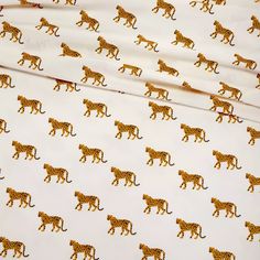 an image of a bed sheet with cheetah on it