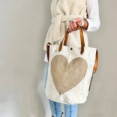 BucketBag heart latte Heart-shaped Brown Bag For Everyday Use, Heart-shaped Travel Bag With Adjustable Strap, Vintage Cotton Shoulder Bag With Leather Handles, Leather Heart-shaped Bag With Adjustable Strap, Everyday Use Heart-shaped Leather Shoulder Bag, Beige Canvas Bag With Adjustable Handle, Heart-shaped Shoulder Bag With Adjustable Strap For Everyday Use, Vintage Cotton Bag With Leather Handles, Vintage Cotton Bags With Leather Handles