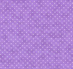 a purple background with white polka dots