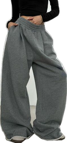 Sporty Gray Sweatpants With Elastic Waistband, Gray Winter Leisure Pants, Gray Leisure Pants For Winter, Gray Sporty Winter Bottoms, Sporty Baggy Gray Joggers, Gray Baggy Sports Pants, Gray Baggy Sporty Joggers, Gray Sporty Bottoms For Winter, Gray Stretch Full Length Sweatpants