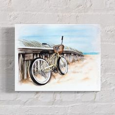 a watercolor painting of a bicycle on the beach next to a wooden fence with sea oats