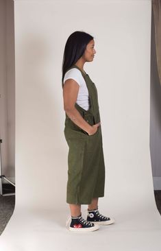 "I HAVE LISTED EACH COLOR AND COTTON WEIGHT IN THEIR OWN LISTING. If you can't find the color you're looking for please let me know. This listing is now for Olive Green only. Bib Overall Rompers with a cropped pant leg that hangs from mid calf to ankle depending on your height and proportions. Made in collaboration with Fair Trade artisans in Nepal - Conscious Clothing made with love. - Olive Green - Dark army green with a tweedy weave incorporating black threads. - A relaxed fit with comfort in Green Bib Front Overalls With Pockets, Green Fall Overalls With Pockets, Green Overalls For Fall, Green Fall Overalls, Green Utility Overalls For Workwear, Military Style Green Overalls With Pockets, Military Green Overalls With Pockets, Conscious Clothing, Womens Overalls