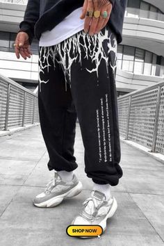 The Demon's Blood Casual Track Pants redefine streetwear with a bold and edgy style. Featuring a unique design inspired by rebellious energy, these track pants offer both comfort and a statement look. Step into the urban realm with confidence, as these pants become a symbol of your distinctive fashion sense. Graphic Print Pants For Winter Streetwear, Winter Cotton Pants With Graphic Print, Winter Graphic Print Bottoms For Streetwear, Graphic Print Bottoms For Winter Streetwear, Graphic Print Bottoms For Streetwear In Winter, Winter Pants With Graphic Print And Relaxed Fit, Winter Relaxed Fit Pants With Graphic Print, Winter Graphic Print Relaxed Bottoms, Winter Graphic Print Relaxed Fit Pants