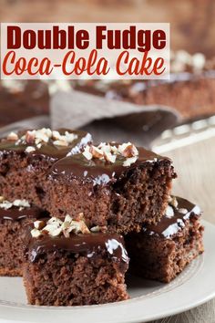 chocolate fudge coca - cola cake on a white plate