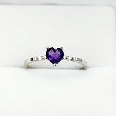 10K White Gold Ring Heart Shape Amethyst 0.31ct Size of stone: 5x5mm Two Diamonds 0.02ct Made in Canada * Comes in a Beautiful Gift Box, Perfect for Gifting * This ring is available in yellow gold and several gemstone selections. Please message me if you need any further information. ------------------------------------------------ * Please click here to visit my shop: https://www.etsy.com/shop/bestjewelryset * To see more rings please check out the link below: https://www.etsy.com/shop/BestJewe Fine Jewelry Amethyst Heart Cut Birthstone Ring, Heart Cut Amethyst Birthstone Ring Fine Jewelry, Heart Cut Amethyst Ring With Accent Stones, Heart Cut Amethyst Jewelry With Center Stone, Heart Cut Amethyst Birthstone Jewelry, Fine Jewelry Amethyst Ring Heart Cut, Fine Jewelry Heart Cut Amethyst Ring, Amethyst Heart Cut Ring For Anniversary, Purple Amethyst Birthstone Ring For Valentine's Day