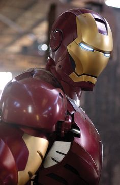 a close up of a iron man suit on display