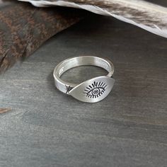 Evil eye protection ring, a talisman believed to guard against evil spirits and bad luck. It also represents spiritual protection, clarity and cleansing.  Available in all sizes. Handmade in solid sterling silver.  MORE SILVER RINGS: https://www.etsy.com/ca/shop/JenniferWoodJewelry?ref=seller-platform-mcnav§ion_id=37080248  Established Etsy Seller since 2006. Get 15% off when you join my email list to receive monthly updates about new work and subscriber-only deals. No spam. Just a lot of shiny Adjustable Sterling Silver Evil Eye Ring, Symbolic Sterling Silver Evil Eye Jewelry, Nickel Free Mystical Sterling Silver Ring, Mystical Sterling Silver Nickel-free Rings, Nickel-free Mystical Sterling Silver Rings, Mystical Nickel-free Sterling Silver Rings, Sterling Silver Evil Eye Ring, Unique Silver Evil Eye Jewelry, Adjustable Sterling Silver Eye-shaped Jewelry