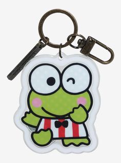 a keychain with a cartoon character on it's front and back sides