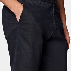 These navy flat-front shorts are cut slim through the hip and thigh, and feature belt loops. Fitted Knee-length Shorts For Business Casual, High-waisted Cargo Shorts With Belt Loops For Workwear, Relaxed Fit Cargo Shorts With Belt Loops, Navy Bottoms With Belt Loops For Business Casual, Fitted Bermuda Business Casual Shorts, Cotton Bermuda Shorts With Belt Loops, Casual Navy Bottoms With Belt Loops, Fitted Pants With Belt Loops, Fitted Short Leg Pants With Belt Loops