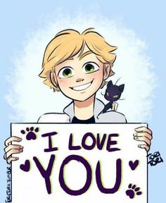 a boy holding up a sign that says i love you with a cat on it