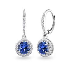 These beautifully attractive earrings feature 7mm round blue stones made with Swarovski crystals in a cubic zirconia studded halo design. The earrings are crafted of fine sterling silver and secure with leverback closures. These are great earrings for daytime or evening wear and are excellent gifts for women teens and girls. These crystal earrings in fine jewelry are great additions to your Swarovski jewelry and cubic zirconia jewelry collections. Size: one size. Gender: female. Age Group: kids. Blue Halo Design Round Cut Earrings, Blue Round Cut Halo Design Earrings, Blue Round Cut Halo Earrings, Blue Halo Setting Round Cut Earrings, Blue Earrings With Halo Setting, Blue Cubic Zirconia Round Earrings, Blue Round Cut Earrings With Halo Setting, Blue Sterling Silver Earrings With Halo Setting, Elegant Round Crystal Birthstone Earrings