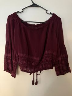 This sheer purple top is a true delight! Size small, with a drawstring waist, and flowing arms. Dress with comfort and style, and make this a staple in your wardrobe today! Long Sleeve Drawstring Top For Vacation, Long Sleeve Drawstring Tops For Beach, Flowy Purple Beach Top, Purple Flowy Beach Top, Purple Tops For Beach In Fall, Purple Tops For Fall Vacation, Purple Fall Tops For Vacation, Casual Purple Tops For Fall Vacation, Long Sleeve Tops With Drawstring For Day Out