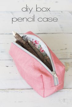 the diy box pencil case is made from an old pink canvas bag and has been folded