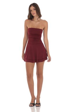 Designed in Los Angeles- Mini Length- Pull-on- Double layered- Made in polyester fabric- Hand wash coldModel is wearing a size small that measures 24in/61cm in lengthSlight modifications might be made to improve garment quality.Handling the garments with care, hand-washing and air-drying is strongly recommended. Mini Wine Red Dress, Maroon Hoco Dress, Maroon Mini Dresses, Christmas Dance Dresses, Short Maroon Dress, Red A-line Mini Dress With Lining, Burgundy A-line Mini Dress For Summer, Cute Dresses For Dances, Dressy Summer Dresses