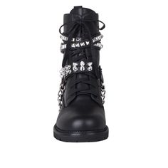 These vibrant and stylish boots will let you enter the world with style. These privileged boots, which are made of vegan leather and adorned with chains and studs, will stand out and provide an edgy edge to any ensemble. They are the ideal choice to transition your outfits from day to night, with an ankle buckle closure for a snug fit and a 1.5"H heel. These fashionable boots are ideal for wearing with jeans or skirts and are sure to draw attention. With these shoes, you'll undoubtedly feel pamp Stylish Boots, Look Your Best, Shoe Box, Fashion Boots, All Black Sneakers, Snug Fit, Hiking Boots, Combat Boots, Vegan Leather