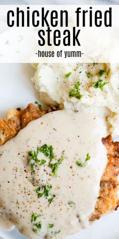 chicken fried steak with mashed potatoes and gravy on a white dinner plate