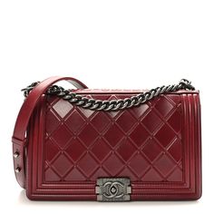 This is an authentic CHANEL Calfskin Embossed New Medium Paris Salzburg Boy Flap in Red. This chic shoulder bag features a crystalline patterned embossed calfskin leather with quilted framing edges in burgundy andthe word Paris-Salzburg embossed along the top of the flap. The bag features a rutheniumchain-link shoulder strap with a shoulder pad. Theflap opens with a ruthenium boy press lock to a burgundy leatherinterior with patch pockets. Coco Handle, Chanel 19, Chanel Tweed, Denim Quilt, Chanel Shoulder Bag, Chanel Caviar, Blue Backpack, Salzburg, New Media