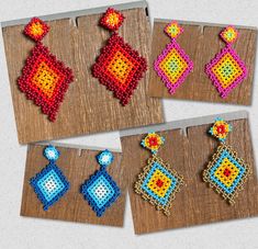 Traditional Mexican Handmade Huichol chaquira (beaded) earrings made by Mexican artisans in the Mexican state of Chipas. The earrings are lightweight, colorful and sure to bring you lots of compliments.  The length is approximately 2 inches and 1.5 inches wide with a post closure. Huichol Earrings, Beadwork Ideas, Traditional Mexican, Bead Jewellery, Bead Earrings, Beaded Earrings, Bead Work, Jewelry Earrings Dangle, Etsy Earrings