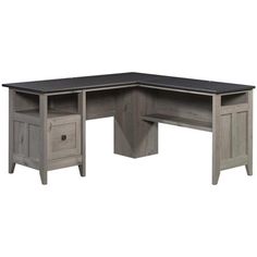 an l shaped desk with two drawers and a black top on the left hand side