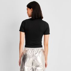 This Seamless Jersey Crop Top from A New Day™ in a solid colors offers easy pairing with a range of looks. Fashioned in a cropped length, it features a classic crewneck and a slim silhouette to give you a fitted look. The lightweight fabric with added stretch and a seamless design offers a more comfortable fit, and you can wear it with your choice of bottoms to create a range of versatile styles. . A New Day™: Style that goes wherever you do. Basic Solid Cropped T-shirt With Ribbed Detail, Stretch Crop Top T-shirt In Solid Color, Solid Ribbed Stretch Cropped T-shirt, Solid Stretch Ribbed Cropped T-shirt, Basic Solid Seamless Tops, Basic Seamless Solid Tops, Solid Cropped T-shirt In Athleisure Style, Basic Solid Color Fitted Cropped T-shirt, Trendy Cropped Seamless T-shirt