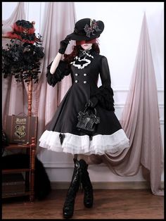 A bolero jacket and sleeveless dress with a black and white striped pattern that makes you look like a clown princess. The jacket is decorated with lace on the cuffs and frills on the hem. The hem of the sleeveless dress is also decorated with lace. Decorating with jabots, brooches, and ribbon clips creates a mysterious yet cute atmosphere. 
 
 
 Item 
 
 Bolero jacket 
 Sleeveless dress 
 Jabot 
 Ribbon brooch 
 Ribbon clip (set of 2) 
 
 
 
 Size 
 
 Bolero jacket 
 
 S size 
 
 Shoulder width Fitted Doll Collar Dress For Cosplay, Fitted Ruffle Dress For Cosplay, Black Long Sleeve Vintage Dress For Costume Party, Vintage Cosplay Dresses For Spring, Vintage Spring Dresses For Cosplay, Vintage Black Dress With Doll Collar, Black Vintage Dress For Spring Costume Party, Vintage Dresses For Spring Cosplay, Black Victorian Dress For Fall Costume Party