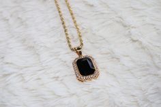 FAST SHIPPING!*TRUSTED SELLER**2300+ TRANSACTIONS* -Will be shipped through USPS with First Class Mail that includes tracking so you'll get it quick! WONT TURN YOUR NECK GREEN! WONT TARNISH. WONT FADE! -Premium 14k gold plated over stainless steel CZ diamond Ruby pendant. -Comes with 20 inch 3mm stainless steel gold plated rope chain. -Stones are high quality VVS simulated lab diamonds(CZ)! -Pendant is about 1 inch tall(without bale) and 3/4 inch wide. -NEW! -Very good quality. Looks even better Elegant Black Cuban Link Necklace, Elegant Black Cuban Link Jewelry, Elegant Black Rope Chain Necklace, Black Pendant Jewelry With Rope Chain, Red Black Green, Unique Pendant Necklace, Ruby Pendant, Cz Diamond, Stone Pendant