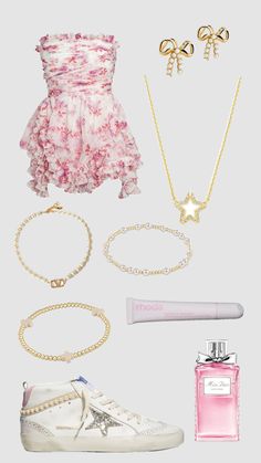 the contents of a pink dress, necklaces and shoes