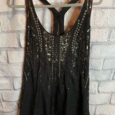 Size S Nwot Black Mini Party Dress Gold Bead And Sequin Detail V-Neckline Pretty Straps In Back Material: 100% Polyester Measurements: Length 30”, Armpit To Armpit 17” Embellished V-neck Tank Top For Party, Spring Embellished V-neck Tank Top, Sequined Halter Neck Tank Top For Night Out, Embellished Fitted V-neck Tank Top, Glamorous Sequined Halter Neck Tank Top, Glamorous Embellished Black Tank Top, Glamorous Halter Neck Sequin Tank Top, Glamorous Black Embellished Tank Top, Glamorous Embellished Sleeveless Tank Top