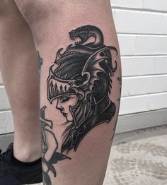 a person with a tattoo on their leg