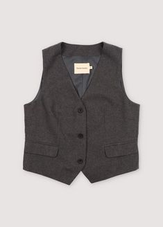 Upgrade your look with our tailored waistcoat, boasting two flap pockets and a front closure adorned with black buttons. This versatile piece is the perfect complement to our matching trousers, creating a polished ensemble that seamlessly blends style and sophistication. 100% cotton / lining: 100% polyester. Trendy Fitted Vest At Affordable Price, Affordable Fitted Zara Vest, Cheap Tailored Women's Vest, Cheap Classic Vest Top, Women's Vest Tweed, Cheap Casual Gray Vest, Cheap Classic Solid Color Vest, Cheap Striped Women's Vest, Cheap Chic Black Vest