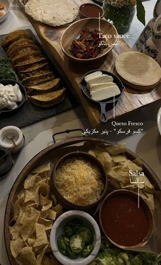 an assortment of food is displayed on a table