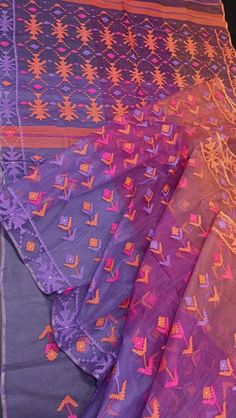 This Exclusive Handwoven Handloom Authentic Original Jamdani Saree is from Dhaka, Bangladesh. This beautiful Saree is crafted with 84 Counts with thread Woven. Exclusive partywear Saree with Unstitched Blouse Piece. The Saree is beautiful and the finest quality. Beautiful Pallu with Tassels. Lightweight and Fall & Pico Done Purple Handloom Semi-stitched Traditional Wear, Purple Chanderi Handloom Blouse Piece, Purple Traditional Wear With Motifs For Transitional Season, Traditional Embroidered Purple Saree, Purple Embroidered Fabric With Zari Work For Puja, Purple Chanderi Blouse Piece With Motifs, Bohemian Purple Embroidered Traditional Wear, Purple Embroidered Fabric For Festivals, Festive Purple Embroidered Fabric With Motifs