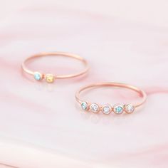 "♥ Family Birthstone Ring ♥ Customed by kids' birthstones, this beautiful and dainty ring is a perfect gift for your mom or your loved one. P R O D U C T ∙ I N F O * Material: Solid 925 Sterling Silver * Finishing: Silver - Yellow Gold - Rose Gold * Up to 5 stones * Each stone measures approx. 1/16'' (2mm) H O W * T O * O R D E R 1. Select the drop-down option you want 2. Please let us know the following information in the \"Add your personalization\" box or \"Note to Seller\" box: - The birthst Family Birthstone Ring, Birthstone Ring Mothers, Jewelry For Mom, Family Ring, Birthstone Stacking Rings, Birthstone Rings, Family Rings, Mom Ring, Fingerprint Jewelry