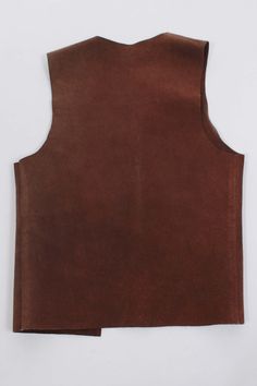 1960s-70s vintage dark brown thick and heavy genuine suede leather open style vest with sewn in place bronze-tone metal O-rings along the opening. This is a minimally processed suede with brown tones than vary from one side to the other as can be seen. a Very cool and versatile true vintage piece! • designer: no labels, handmade • origin: n/a • fabric: genuine suede leather-thick and heavy • color: brown • condition: excellent-no odors, holes, one dark scuff near the bottom corner as shown in th Brown Leather Sleeveless Vest, Brown Leather Vest, Suede Vest, Style Vest, Vintage Suede, Brown Tones, 70s Vintage, Long Sleeve Maxi, Kimonos