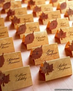 wooden place cards with maple leaves on them