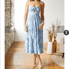 Bought From A Boutique For A Trip. Adorable Pattern And Keyhole Opening. It Was Too Tight In The Top (Bra Size Is 34c) Otherwise It Was Perfect! Summer Strapless Midi Dress For Brunch, Strapless Sundress Midi Dress For Brunch, Chic Blue Strapless Sundress, Blue Strapless Sleeveless Dress For Vacation, Blue Strapless Mini Dress For Vacation, Knee-length Strapless Sundress For Vacation, Strapless Knee-length Sundress For Vacation, Light Blue Strapless Midi Dress For Summer, Blue Strapless Midi Dress For Day Out