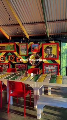 an empty restaurant with colorful tables and chairs