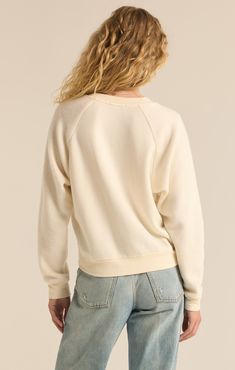 Get ready to snuggle up in the Saldana Reverse Fleece Top. With its super soft and comfortable reverse texture, this midweight pullover will be your go-to choice. The heavy soft wash adds an extra level of coziness, making it perfect for everyday wear. Plus, the regular fit and crew neck make it an easy, effortless option. Fabric: Reverse Cozy: 52% Polyester/48% Viscose Cozy Relaxed Fit Soft-washed Sweats, Super Soft Sweatshirt For Fall Lounging, Cozy Fit Sweats, Cozy Sweatshirt For Lounging, Cozy Fleece Sweater With Soft Texture, Cozy Soft-washed Everyday Sweater, Comfy Soft Knit Sweatshirt For Loungewear, Cozy Fit Sweats With Soft Texture, Cozy Soft Texture Tops For Everyday