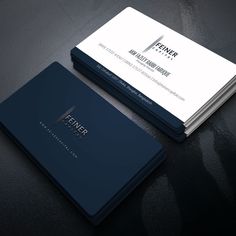 two business cards on top of each other, one with the letter f in black and white