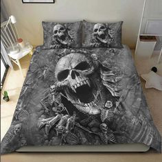 a black and white bed with two skeletons on it