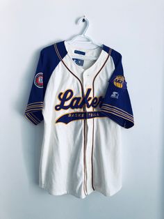 "Los Angeles Lakers vintage starter script button down baseball jersey.  Size: L pit to pit: 24\" neck to bottom: 31\"" Throwback College Baseball Jersey With Letter Print, Throwback Cotton Baseball Jersey For Game Day, Throwback Baseball Jersey With Team Logo, Throwback College Baseball Jersey For Sports Season, College Throwback Baseball Jersey For Sports Season, Throwback Cotton Baseball Jersey For Sports Events, College Throwback Baseball Jersey, Cotton Baseball Jersey With Team Logo For Streetwear, Throwback Baseball Jersey With Letter Print