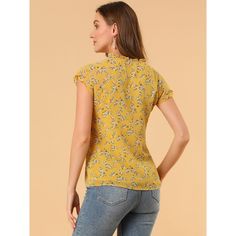 Lightweight and breezy, the shirt is perfect for sunshine styling. A floral print updates this top, perfect for adding a summer pattern to warm-weather looks. Made of a lightweight fabric, the printed style has a self-tie decor at the neckline and a ruffled trim. It has a loose fit that falls to the hip, so you can easily tuck it into skirts or jeans. Trendy Yellow Printed Blouse, Trendy Printed Yellow Blouse, Chic Yellow Printed Top, Chic Printed Yellow Tops, Trendy Short Sleeve Tops With Ditsy Floral Print, Floral Print Short Sleeve Tops For Day Out, Trendy Ditsy Floral Print Top For Day Out, Feminine Printed Summer Blouse, Trendy Floral Print Beach Blouse