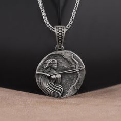 Artemis Silver Necklace 3D, Collectable Medallion, Handmade Pendant Necklace Gift, Greek Mythology Necklace for Women, goddess Necklace Made of 925 silver and handcrafted by hand, this ring is not only an accessory piece that complements your daily elegance, but also has details that will reflect your character and style. It is also a great gift to give to your loved ones on their special days. At SavisSilver, we always give importance to the satisfaction of our customers, we recommend you to re Handmade Silver Goddess Jewelry, Silver Mythological Necklace For Gift, Mythological Style Silver Necklace For Gift, Silver Handmade Mythological Necklace, Handmade Silver Mythological Necklace, Silver Goddess Medallion Necklace, Goddess Style Silver Medallion Necklaces, Goddess Style Silver Medallion Necklace, Handmade Silver Goddess Necklace