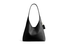 COACH Brooklyn Shoulder Bag 28 - Shoulder Handbags : Black : Please Note: COACH items cannot be shipped to military addresses (APO or FPO) and addresses in Hawaii, the Virgin Islands, Guam or any other locations outside of the continental US. Carry your essentials in chic style with the COACH Brooklyn Shoulder Bag 28. Crafted from natural grain leather, this bag comes with a magnetic snap closure, an inside snap pocket and branding on front. Fixed shoulder strap. Imported. Measurements: Bottom Width: 11 in Depth: 3 1 4 in Height: 11 in Handle Drop: 10 1 2 in On The Go Essentials, Coach Hobo Bag, Chic Purses, The Virgin Islands, Coach Hobo, Handbags Black, Tan Bag, Hobo Style, Fall Winter Wardrobe