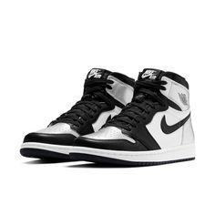 This WMNS Air Jordan 1 High OG “Silver Toe” is dressed in a Black, Metallic Silver, and White colorway. Black leather overlays an otherwise tumbled white upper across the toe cap, Swoosh, ankle, and tongue. Jordan Model, Nike Air Jordan 1 Retro, Womens Air Jordans, Limited Edition Sneakers, Jordan 1 High Og, Air Jordan 1 Retro High Og, Air Jordan 1 Retro High, Womens Athletic Shoes, Jordan 1 High