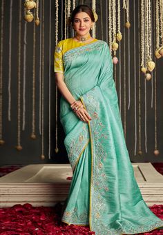 Kajal aggarwal Silk bollywood Saree in sea green colour 5225 Desc: Style : Bollywood Sarees Color : Sea Green Fabric : Silk Wash Care : Dry clean Sleeve Style : Half Sleeve Long Sleeves : Done only in Custom Stitch Sleeves Lining : Done only in Custom Stitch Bust Size : 32 to 42 Inches Occasion : Festival Diwali Eid Durga Pooja Ganesh Charturthi Dussehra. With Express Free Shipping Buy Indian Party wedding wear Bridal Sarees Kajal aggarwal Silk bollywood Saree in sea green colour 5225 online in Sea Green Saree, Celebrity Saree, Indian Wedding Sarees, Fashionable Saree, Lehenga Designs Simple, Raw Silk Saree, Saree Embroidery, Yellow Saree