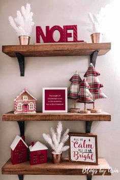 two shelves with christmas decorations and other items on them