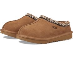 NEW KIDS UGG TASMAN SLIPPER SUEDE COLOR: CHESTNUT SKU # 1019066K SIZES PLEASE NOTE THE SIZES LISTED IT'S US SIZES 3 KIDS - 4.5 WOMEN US 4 KIDS - 5.5 WOMEN US 5 KIDS - 6.5 WOMEN US 6 KIDS - 7.5 WOMEN US ALL OUR SHOES ARE 100% AUTHENTIC IN THE ORIGINAL BOX WITH THE TAG OR MONEY BACK DESCRIPTION This product was made in a factory that supports women in the UGG supply chain with the help of HERproject, a collaborative initiative that creates partnerships with brands like UGG to empower and educate women in the workplace. Be ready for a sleepover with the UGG® Kids Tasman II slipper! Suede upper. Tasman braid collar. Easy slip-on design. UGGpure™ wool lining. UGGpure™ wool footbed. Treadlite by UGG™ synthetic outsole. Imported. Returns Returns are only accepted for unworn shoes. In the event of Ugg Slippers Kids, Uggs For Kids, Trendy Uggs, Kids Ugg Slippers, Tasman Uggs, Matching Slippers, Cute Uggs, Women In The Workplace, Chestnut Uggs