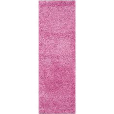 a pink rug on a white background with no one in it or someone else to the side